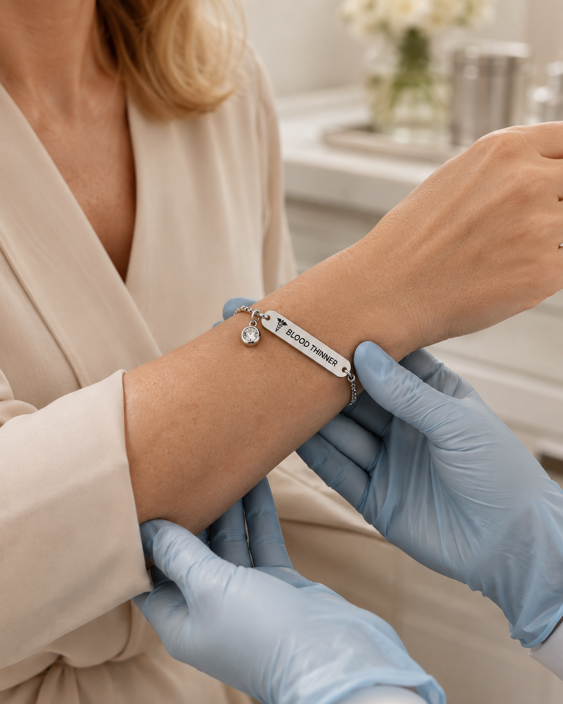 Silver-color DAYMERIT bracelet with clear black BLOOD THINNER engraving