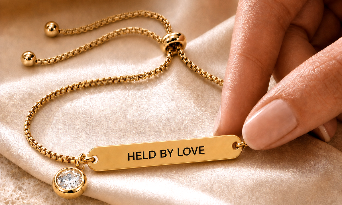 WristNote front BLOOD THINNER and reverse HELD BY LOVE engraving